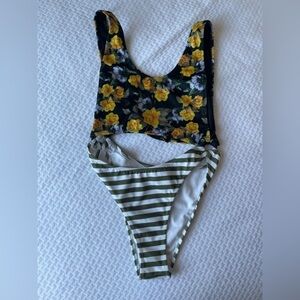 - Yandy size large one piece bathing suit